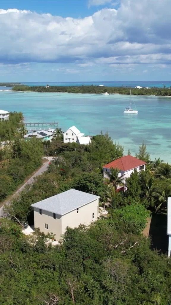 Lo Key Estate: Tropical Waterfront Compound with 2 Apartments + Luxury Villa + 2 waterfront building parcels $2,895,000